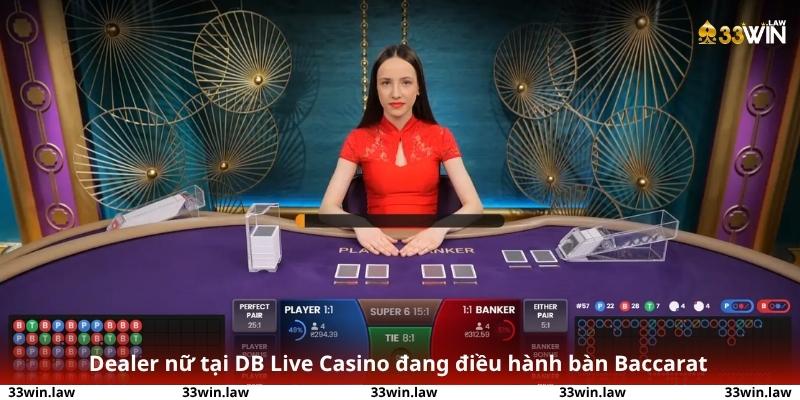 Dealer nữ tại DB Live Casino đang điều hành bàn Baccarat – thần thái và chuyên nghiệp.